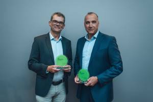 Peter Skerlan und Norbert Haslacher mit ihren Auszeichnungen