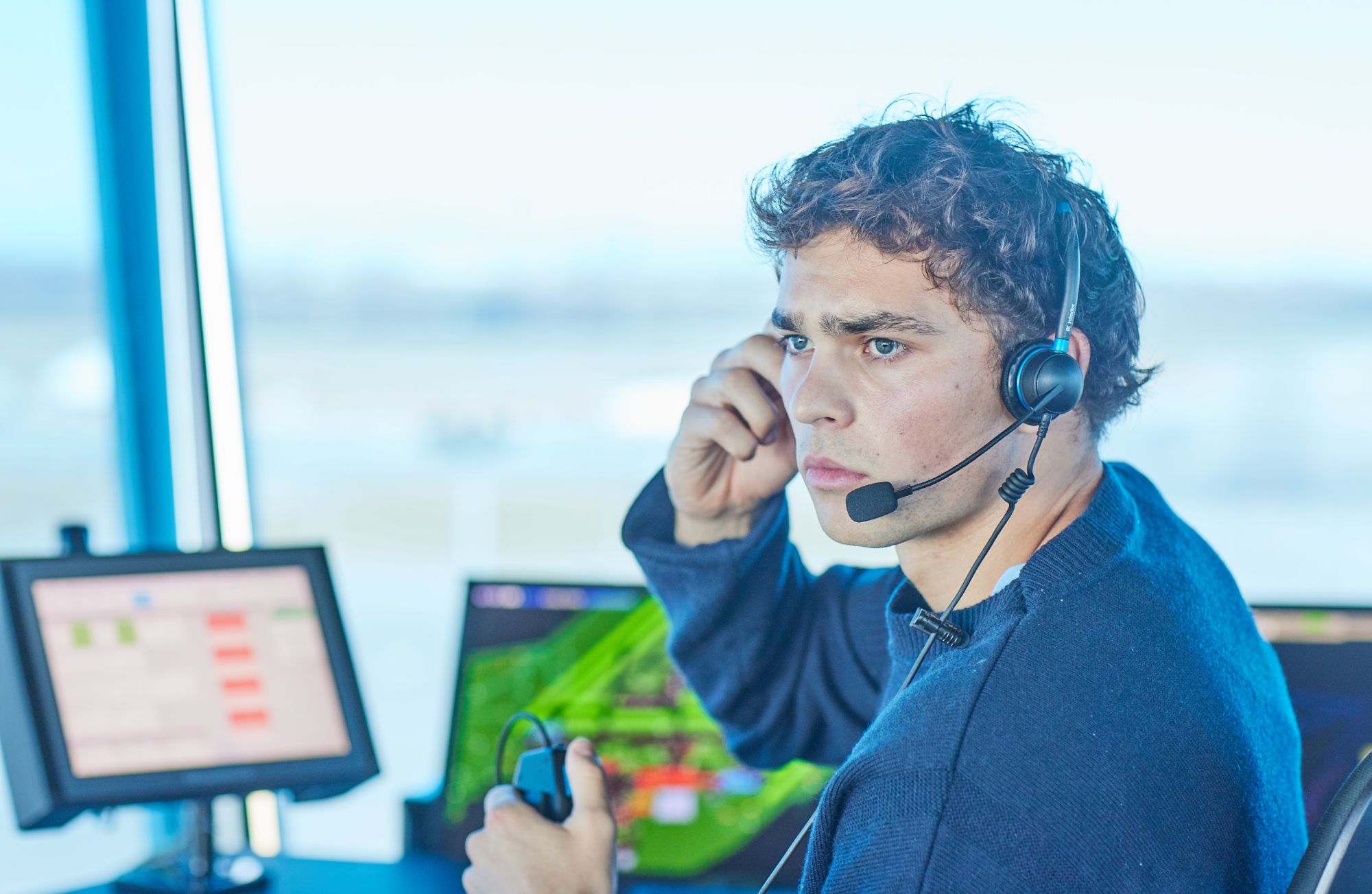 customer reference header picture showing the inside of a tower and an operator