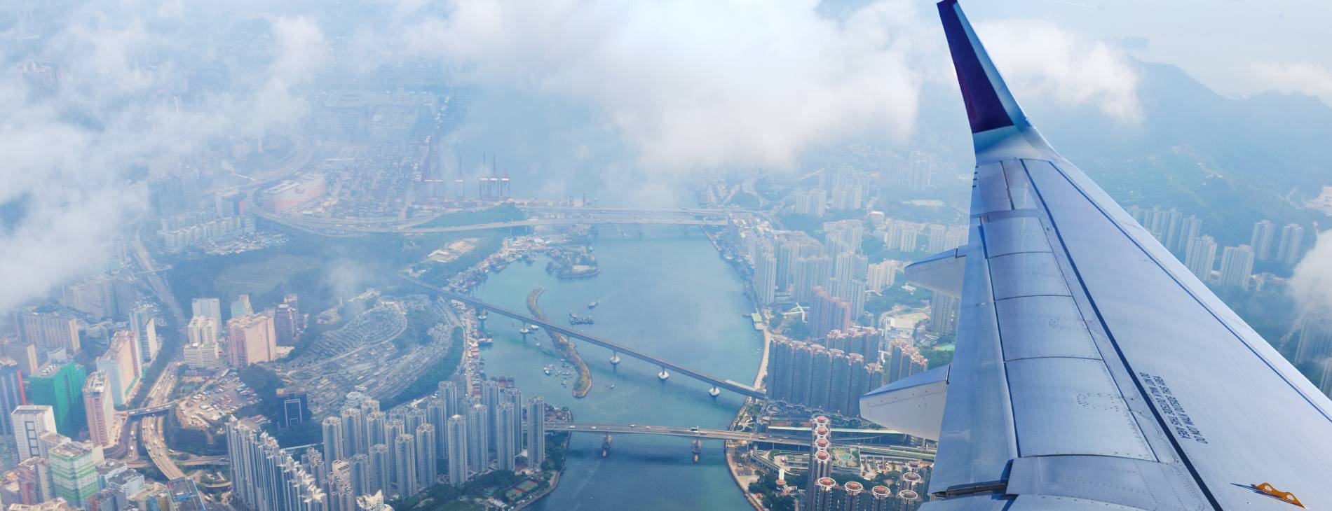 View from an airplane down to the skyline of Hong Kong