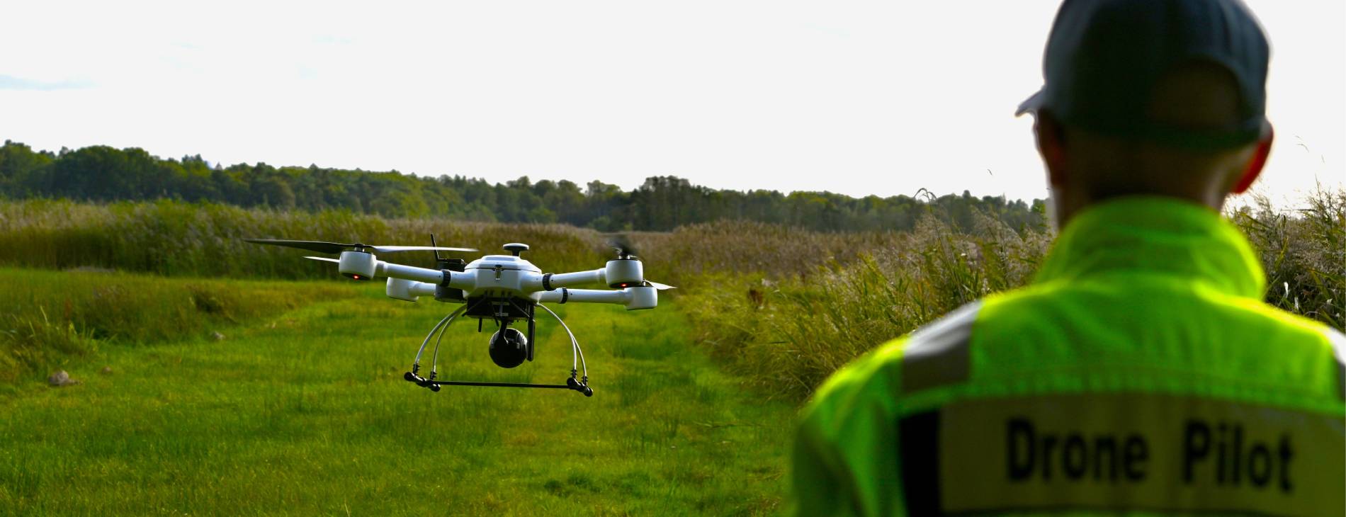 a drone pilot and a drone